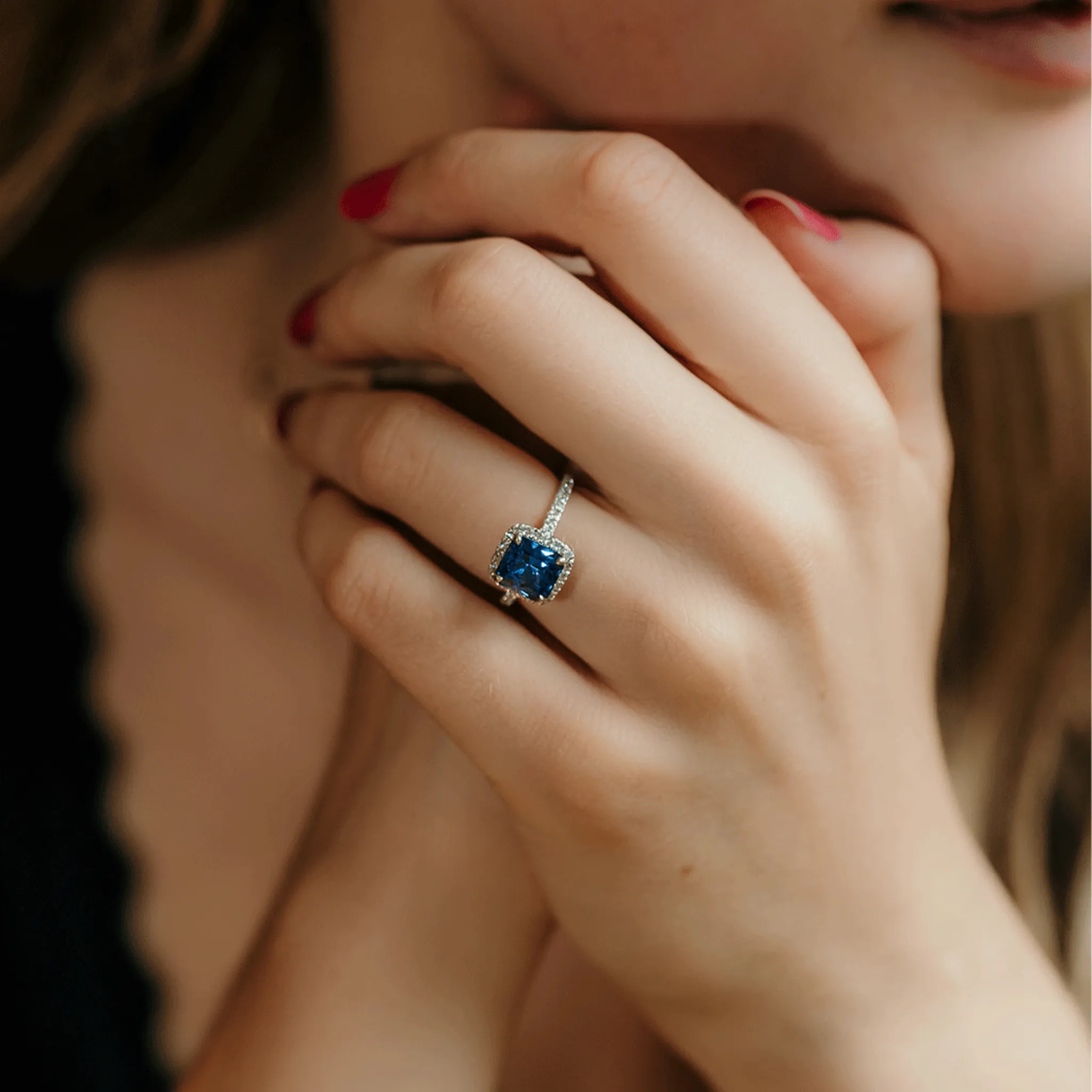 Blue Sapphire and Diamond Halo Engagement Ring