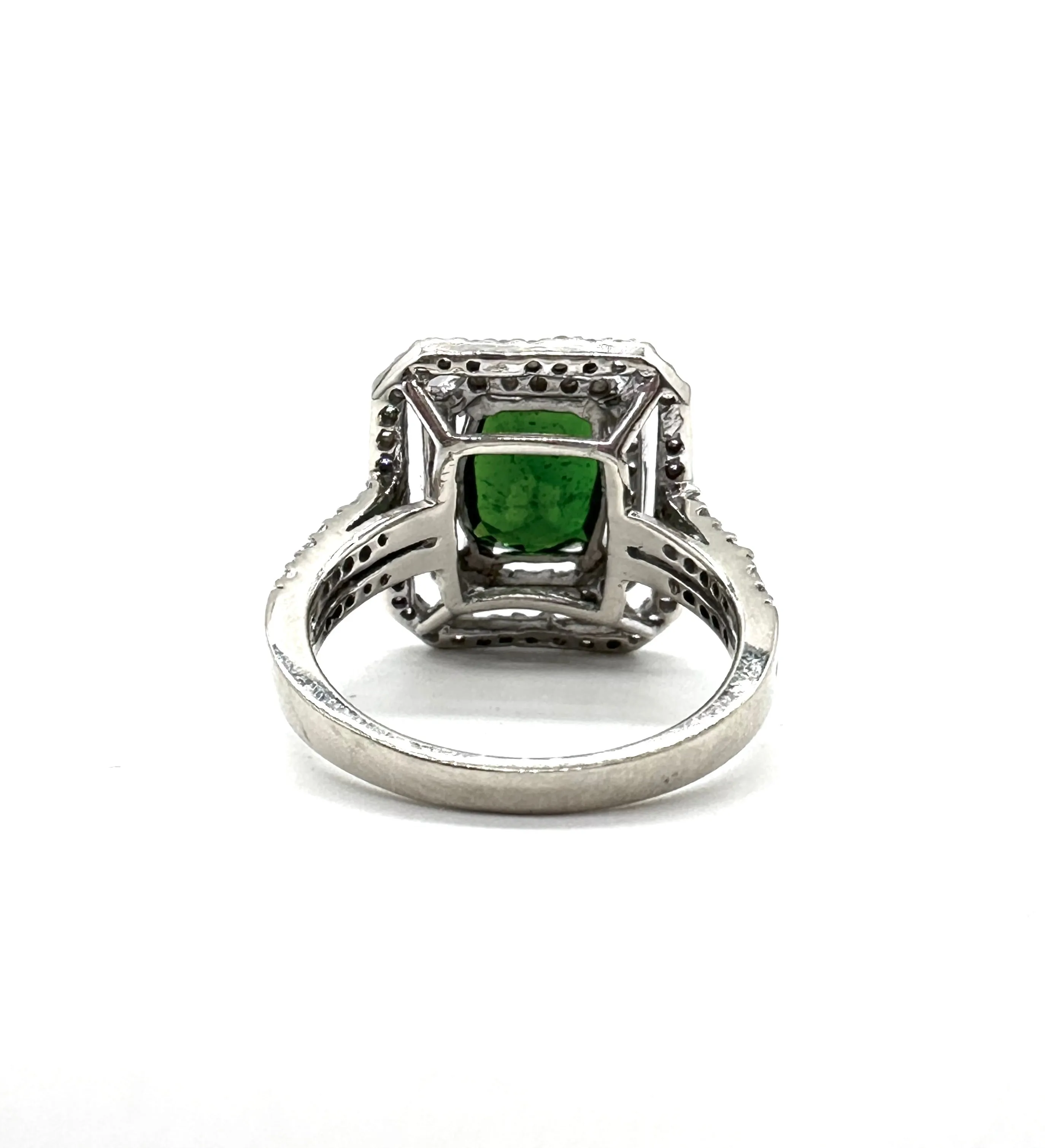 Double diamond halo and green tourmaline ring