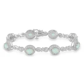 Jewelili Sterling Silver 7 x 5 mm Oval Shape Created Opal and Created White Sapphire Fashion Bracelet, 7.25"