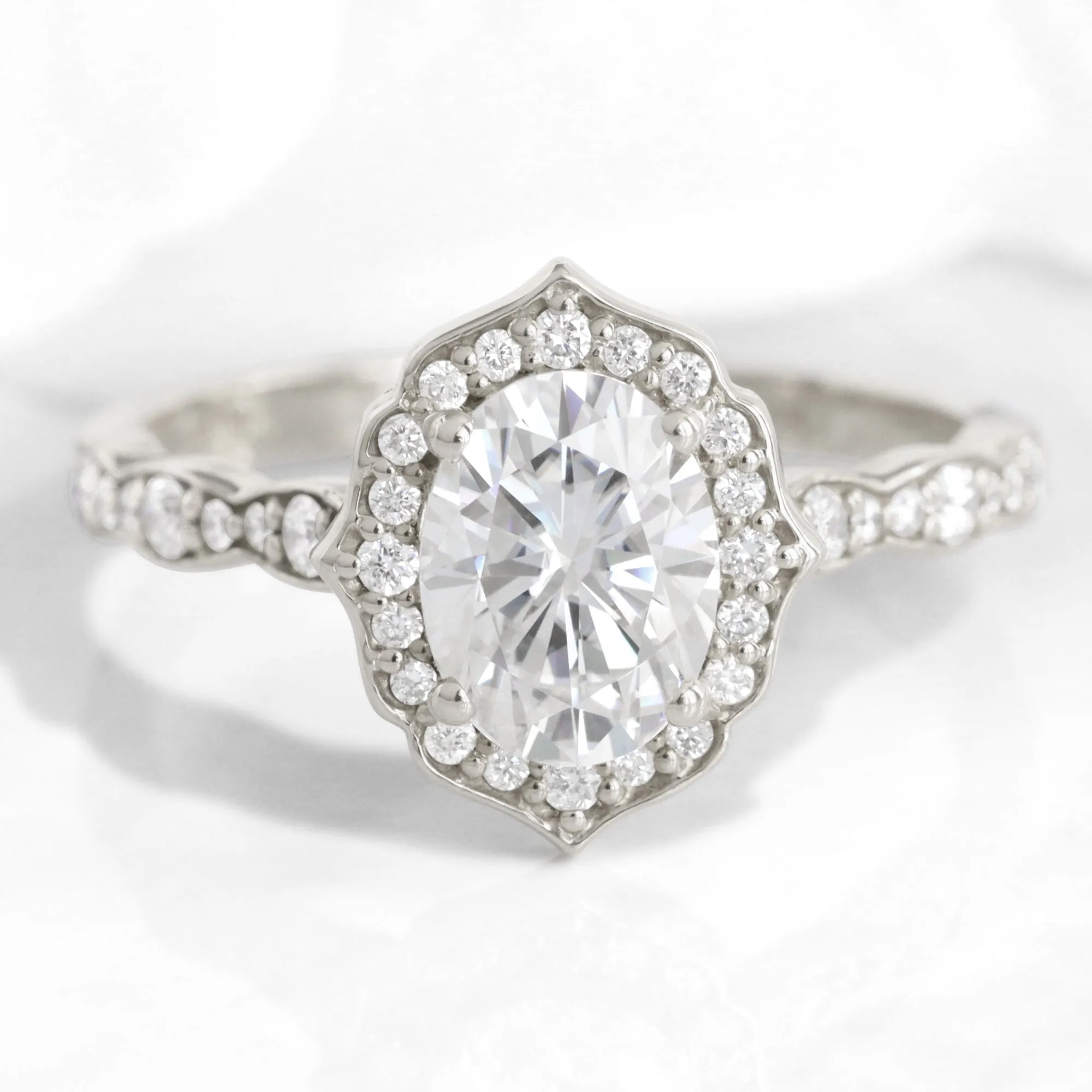 Oval Moissanite Engagement Ring in Vintage Floral Diamond Band