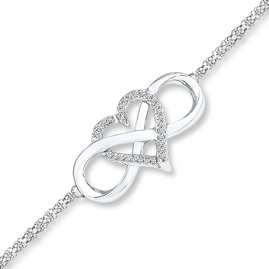 Pre-Owned 1/8 ct Diamond Heart Infinity Bracelet in Sterling Silver