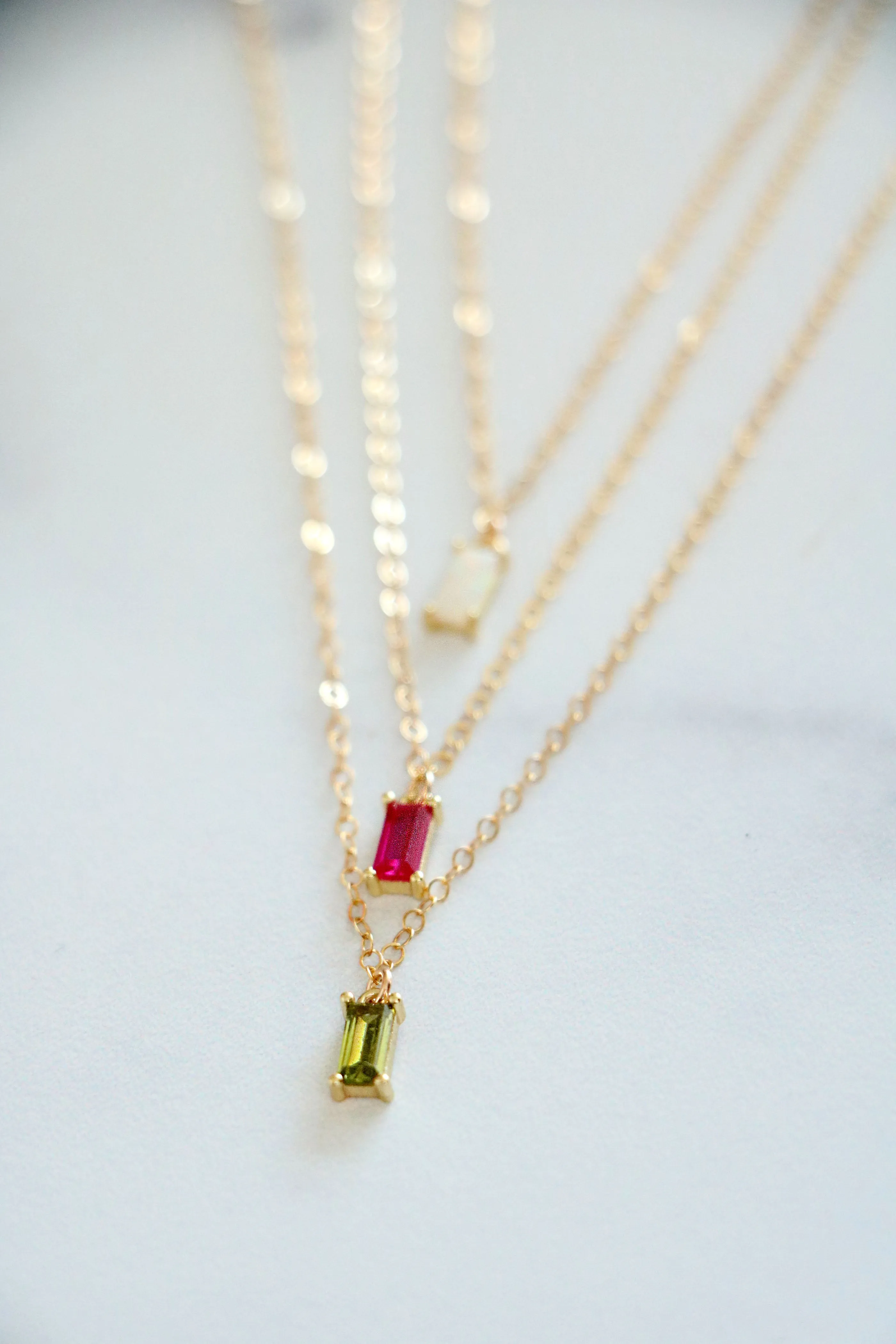 solitaire baguette birthstone necklace