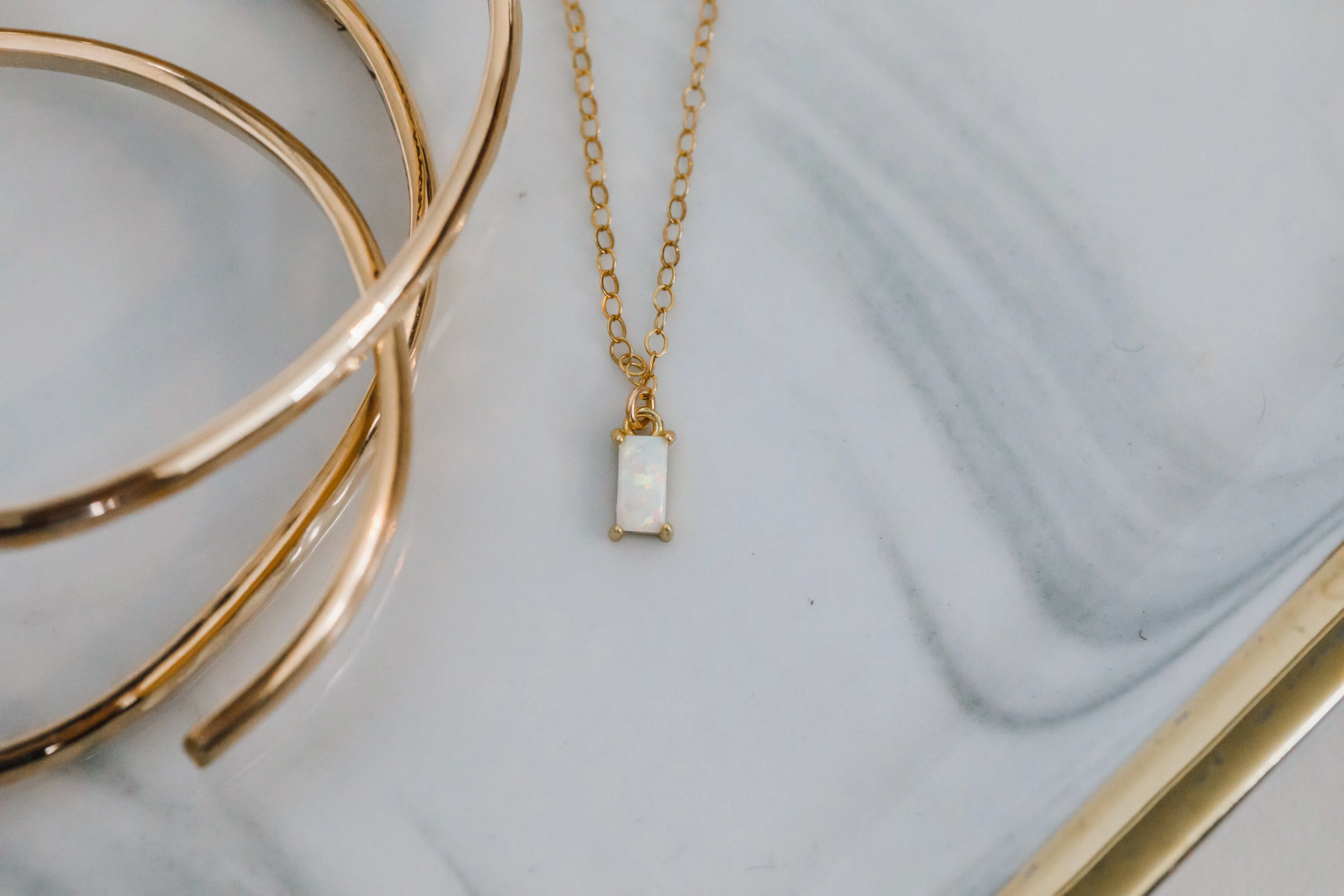 solitaire baguette birthstone necklace