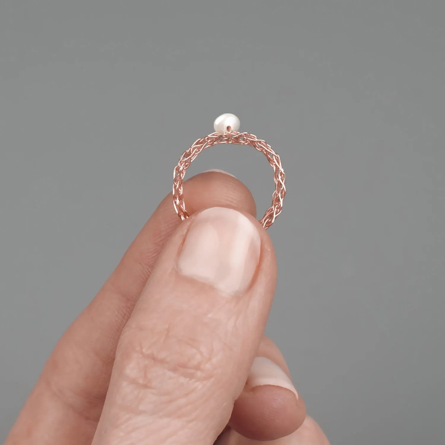 Thin rose gold ring with a pearl