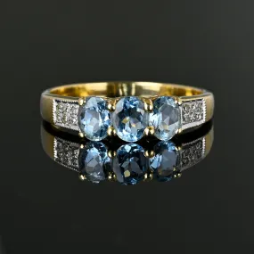 Vintage Diamond Three Stone Aquamarine Ring in Gold